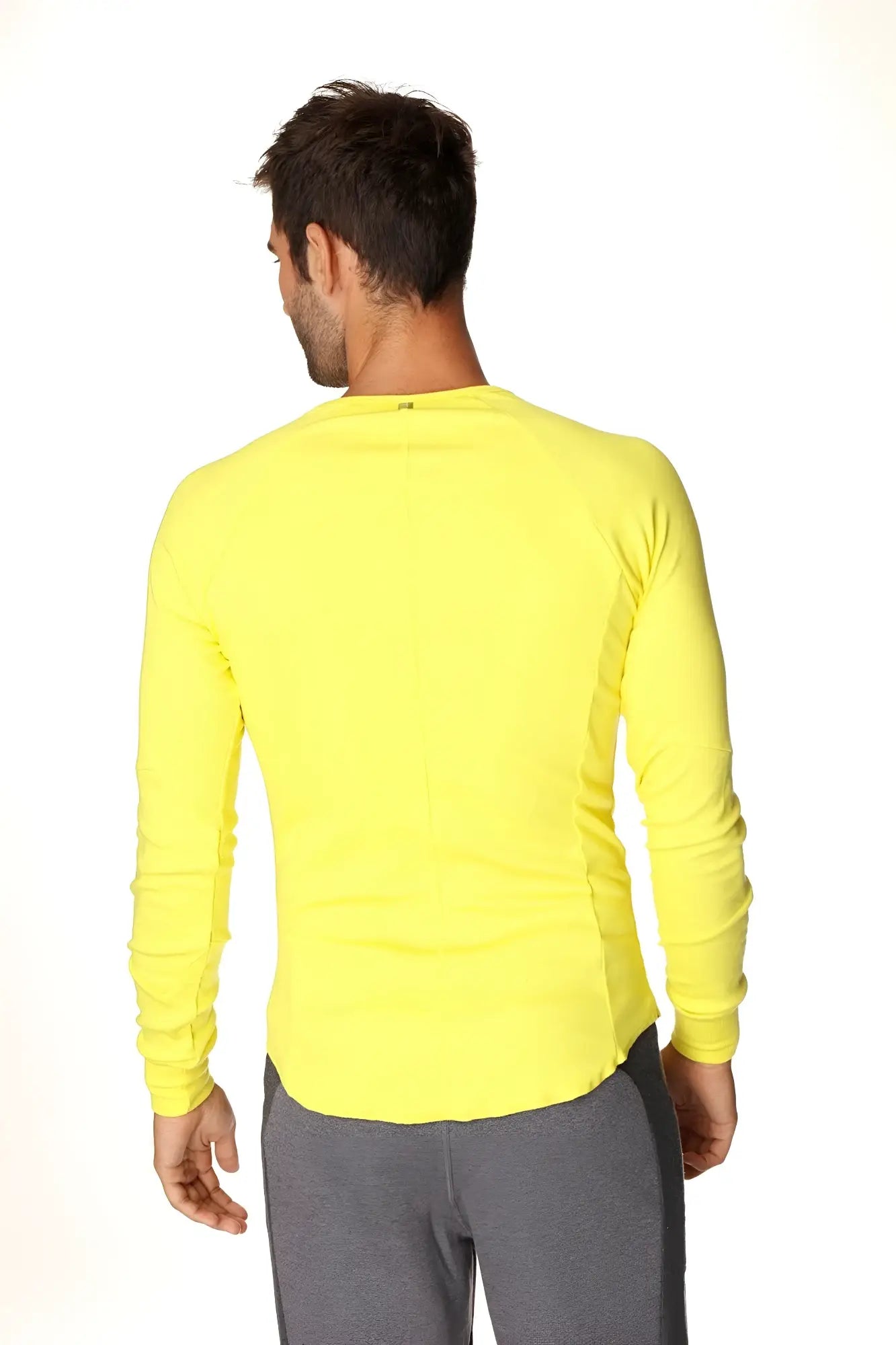 Thermal v-neck long sleeve athletic shirt in tropic yellow with fitted cut and ribbed cuffs for cold weather wear