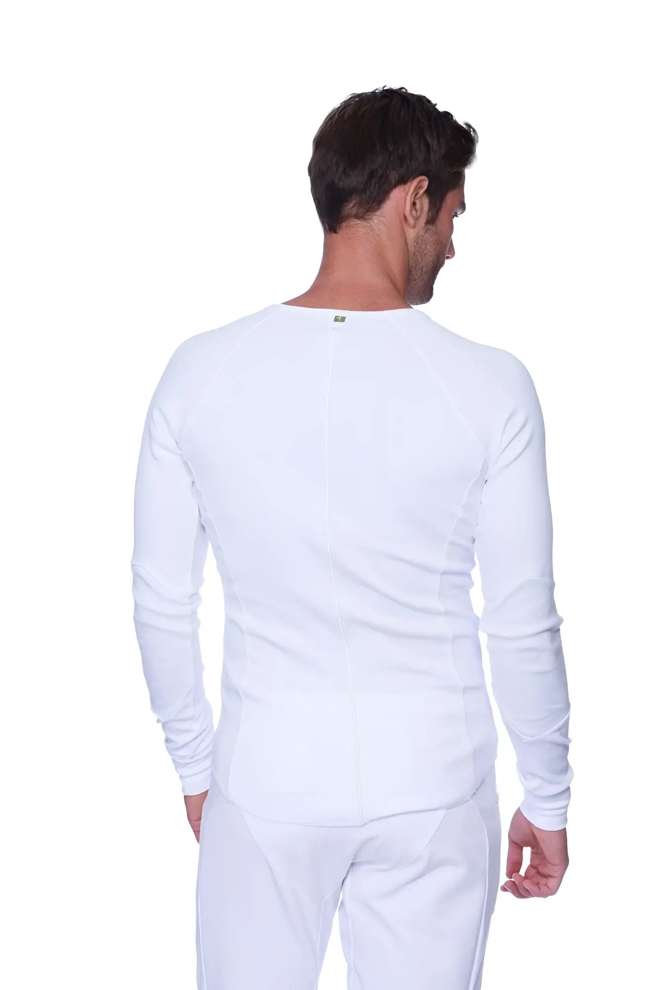 White men’s thermal long-sleeve shirt with crew neck and subtle seam detailing for layering and warmth