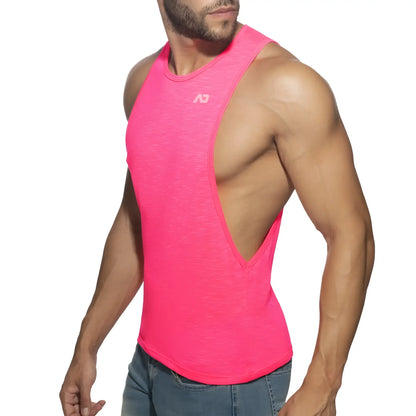 Bright pink thin flame low rider athletic tank top with distinctive cutout back and subtle brand logo on chest front view