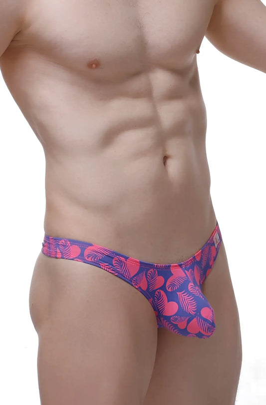 Vibrant pink and purple heart and leaf patterned thong bulan tropical hearts with soft fabric front view
