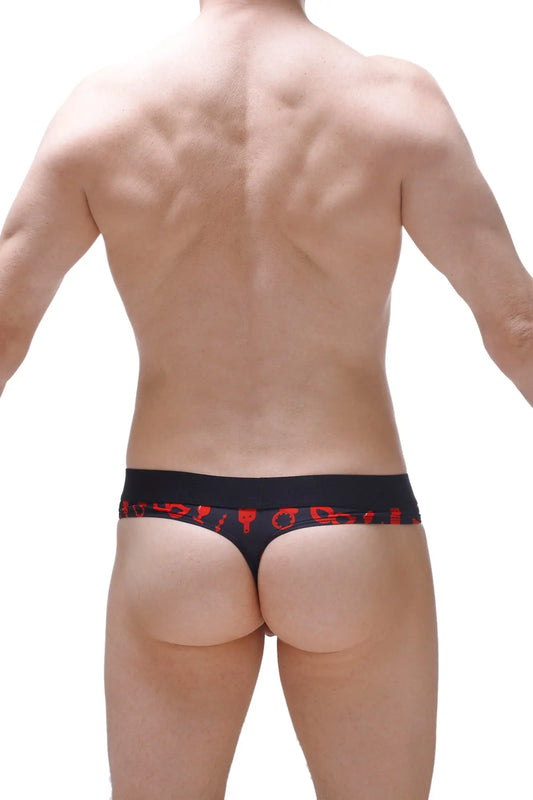 Black thong with red symbolic waistband patterns featuring a hole cockring for boudoir use back view