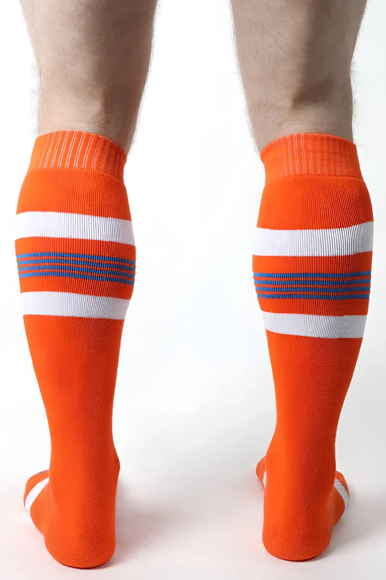 Tight end knee high athletic socks in bright orange with white and navy blue horizontal stripes for sports use