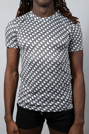 Black and white geometric-patterned short-sleeve rash guard tile print tee for sun protection and water sports