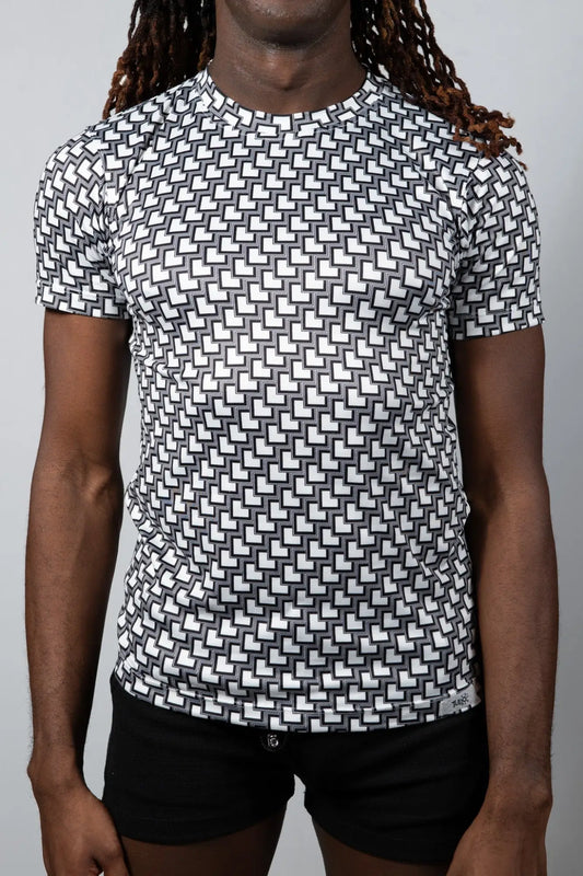 Black and white geometric-patterned short-sleeve rash guard tile print tee for sun protection and water sports
