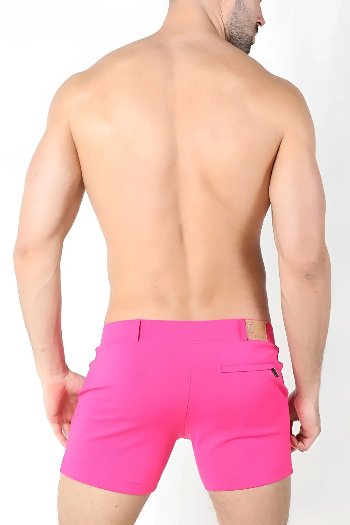Bright pink tailored fit shorts with a small brown leather patch on the waistband timoteo santa monica size m