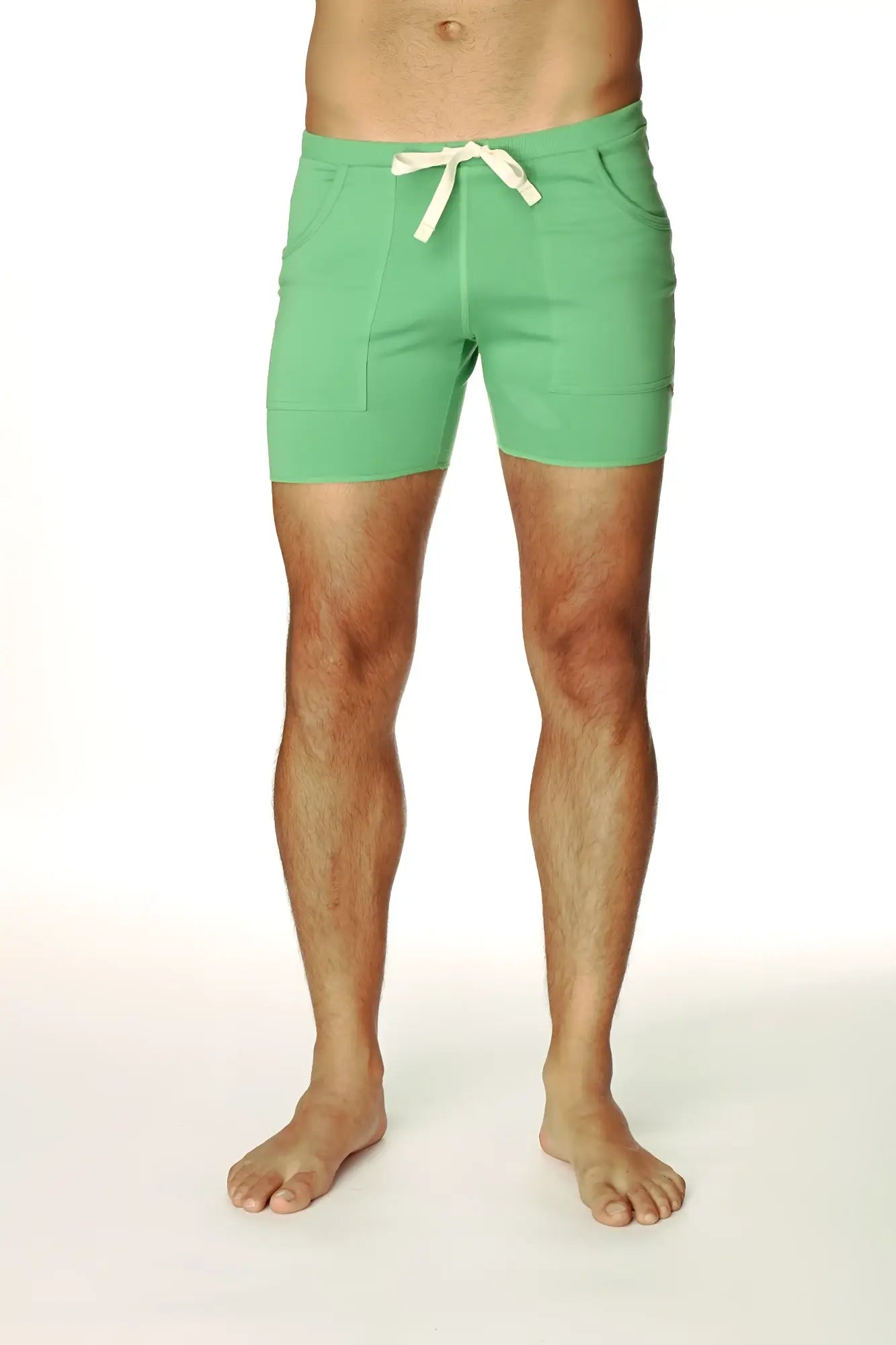 Transition yoga short bamboo green in mint with two front pockets and a cream tie made from bamboo fabric