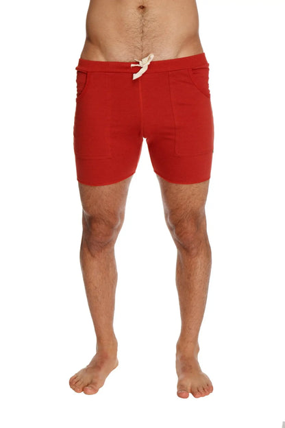 Red transition yoga shorts with white drawstring and two side pockets designed for athletic use