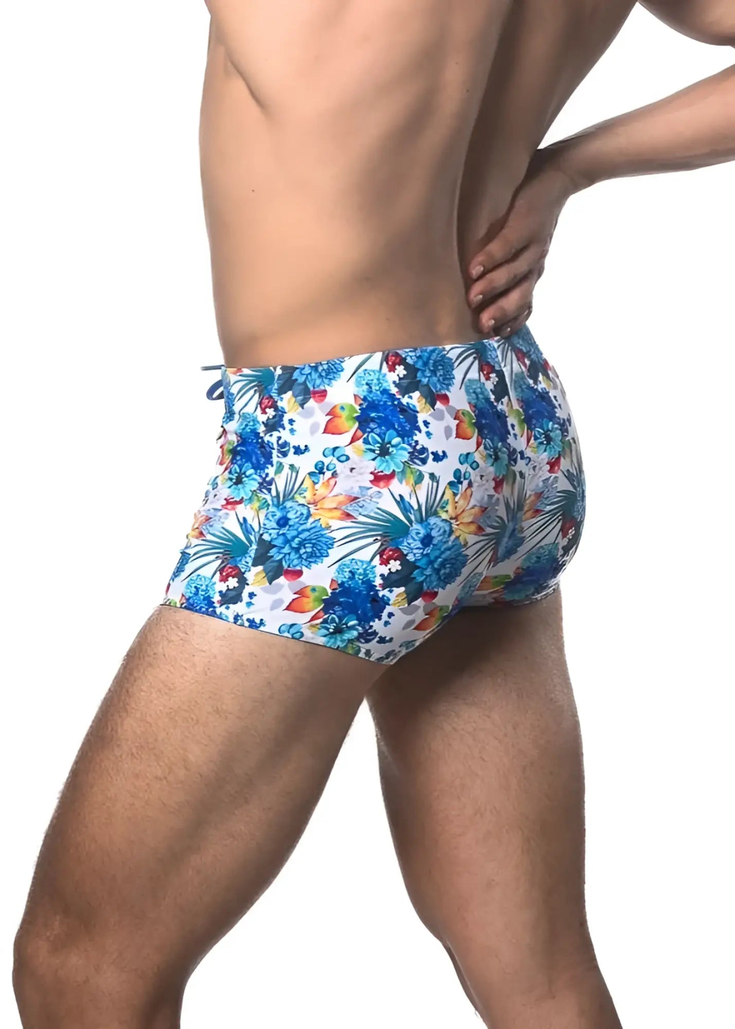Blue and multicolored tropical floral printed swim trunk featuring vibrant patterns perfect for beachwear