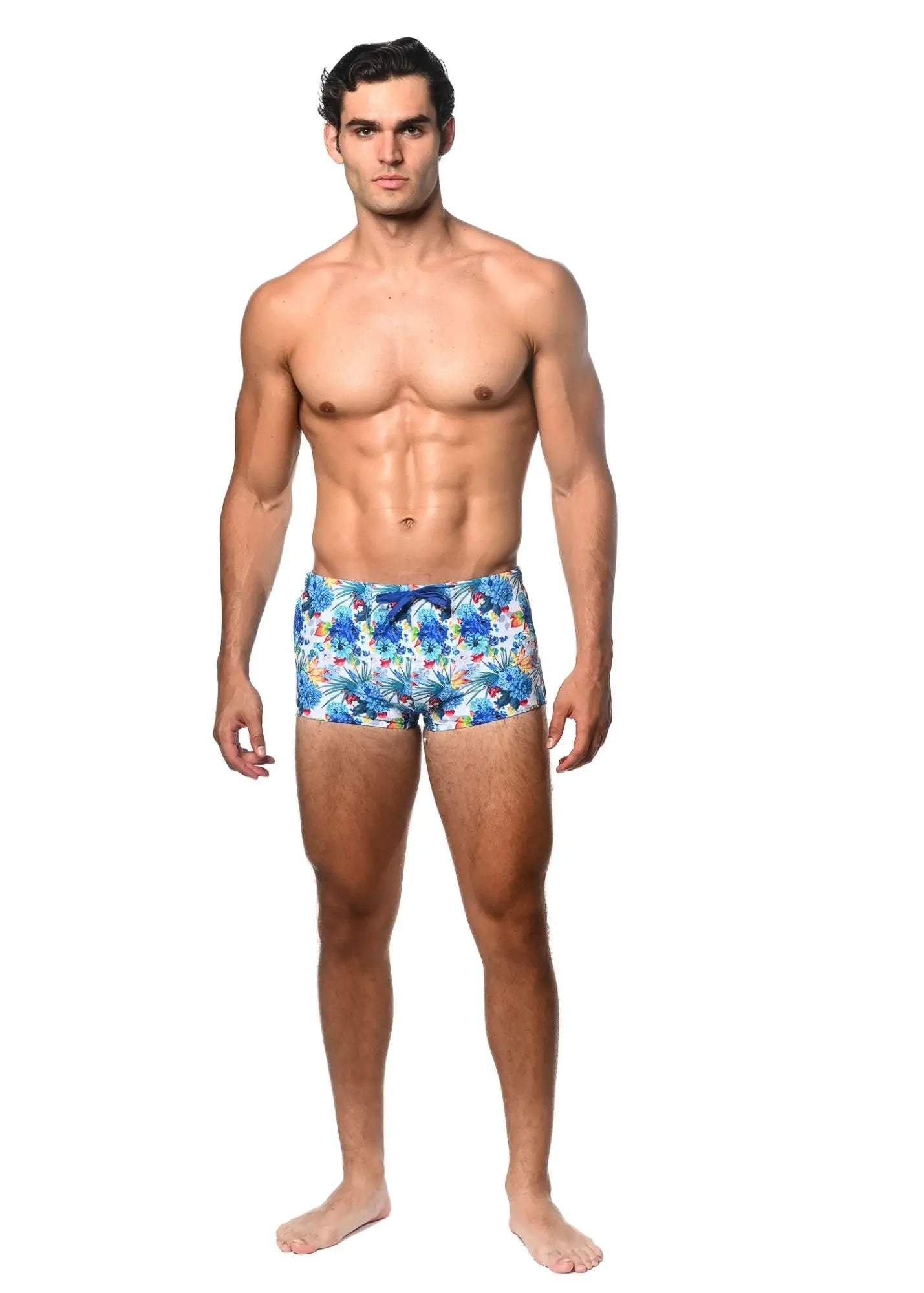 Tropics printed swim trunk featuring blue and white tropical print with a matching blue drawstring for beachwear