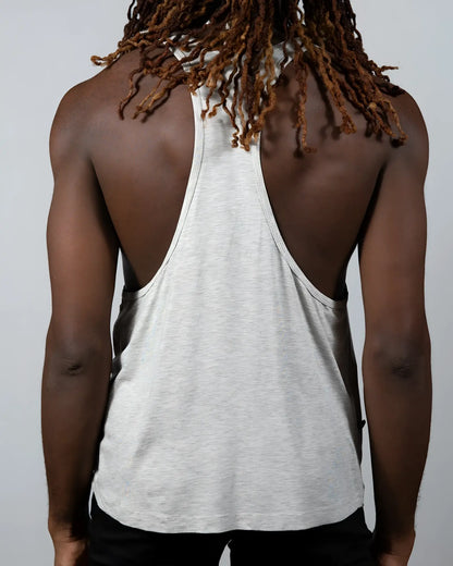 A heather gray tulio racerback tank with relaxed fit and subtle side seam detailing shown from the back side
