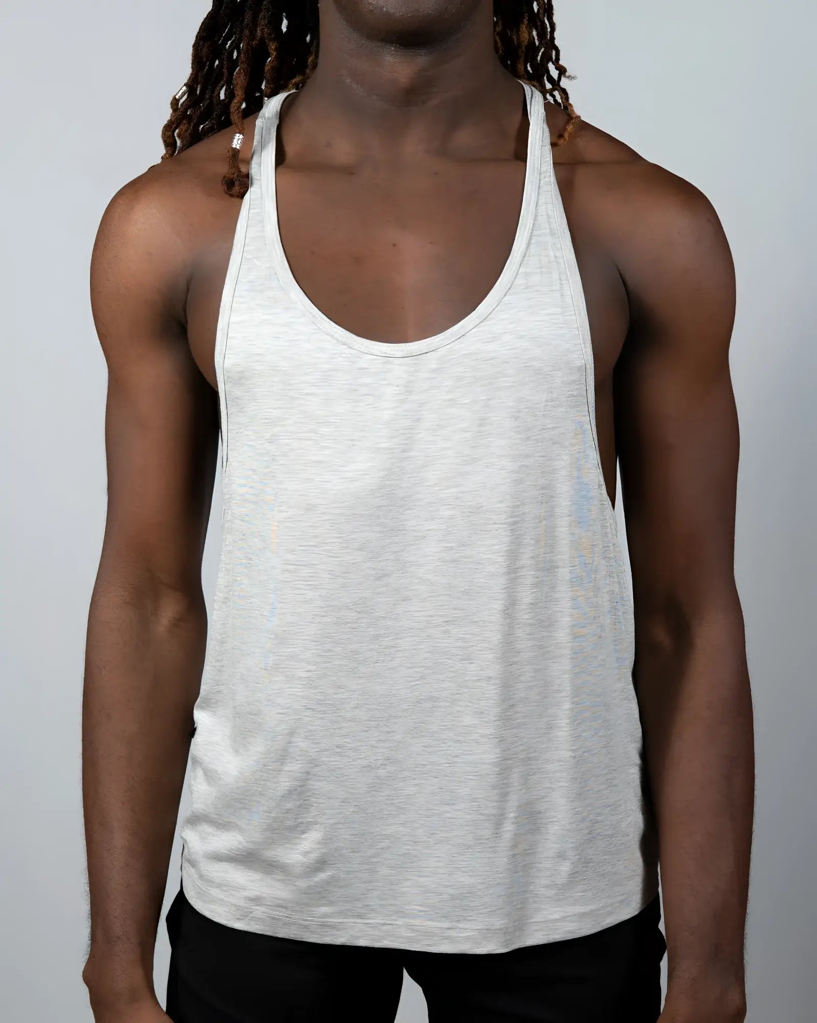 A light gray heathered cotton tulio racerback tank top with a classic racerback design shown from the back side