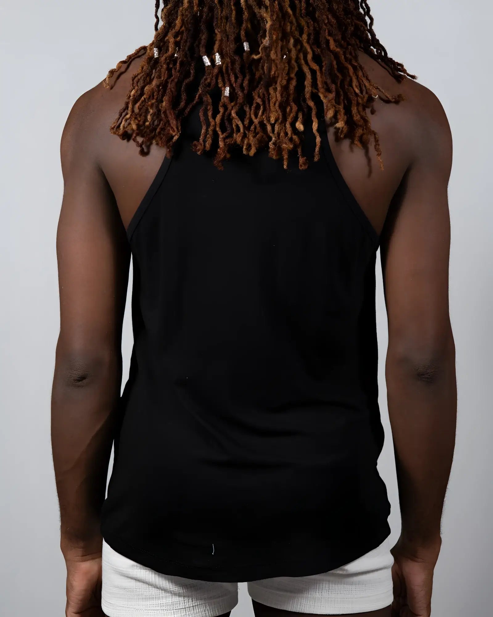 Black sleeveless tulio solid tank top with relaxed fit and rounded hem ideal for casual wear