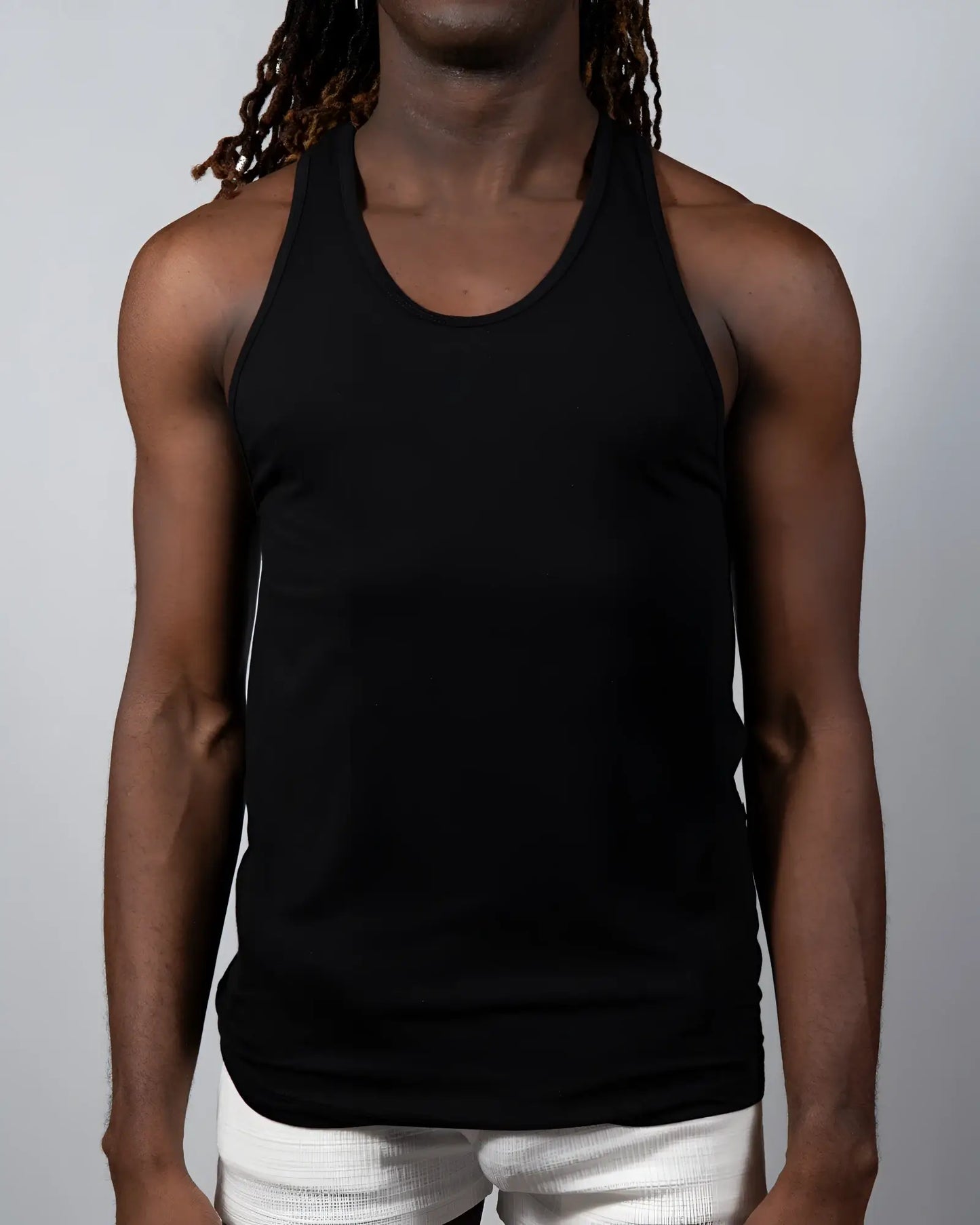 Black sleeveless Tulio solid tank top with rounded neckline and fitted silhouette perfect for casual wear