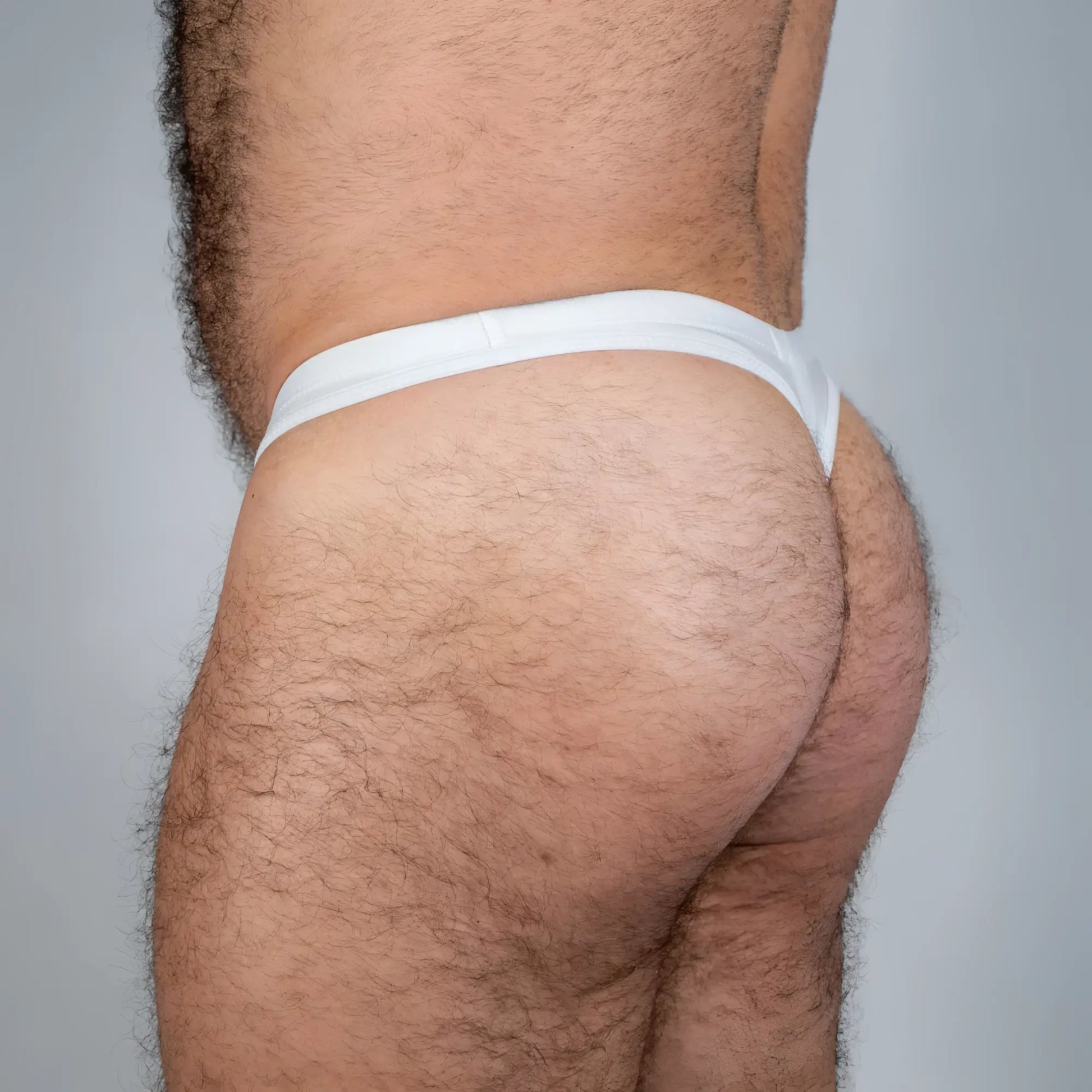 White cotton tulio swim thong solids with a simple seamless design ideal for comfortable swimwear use