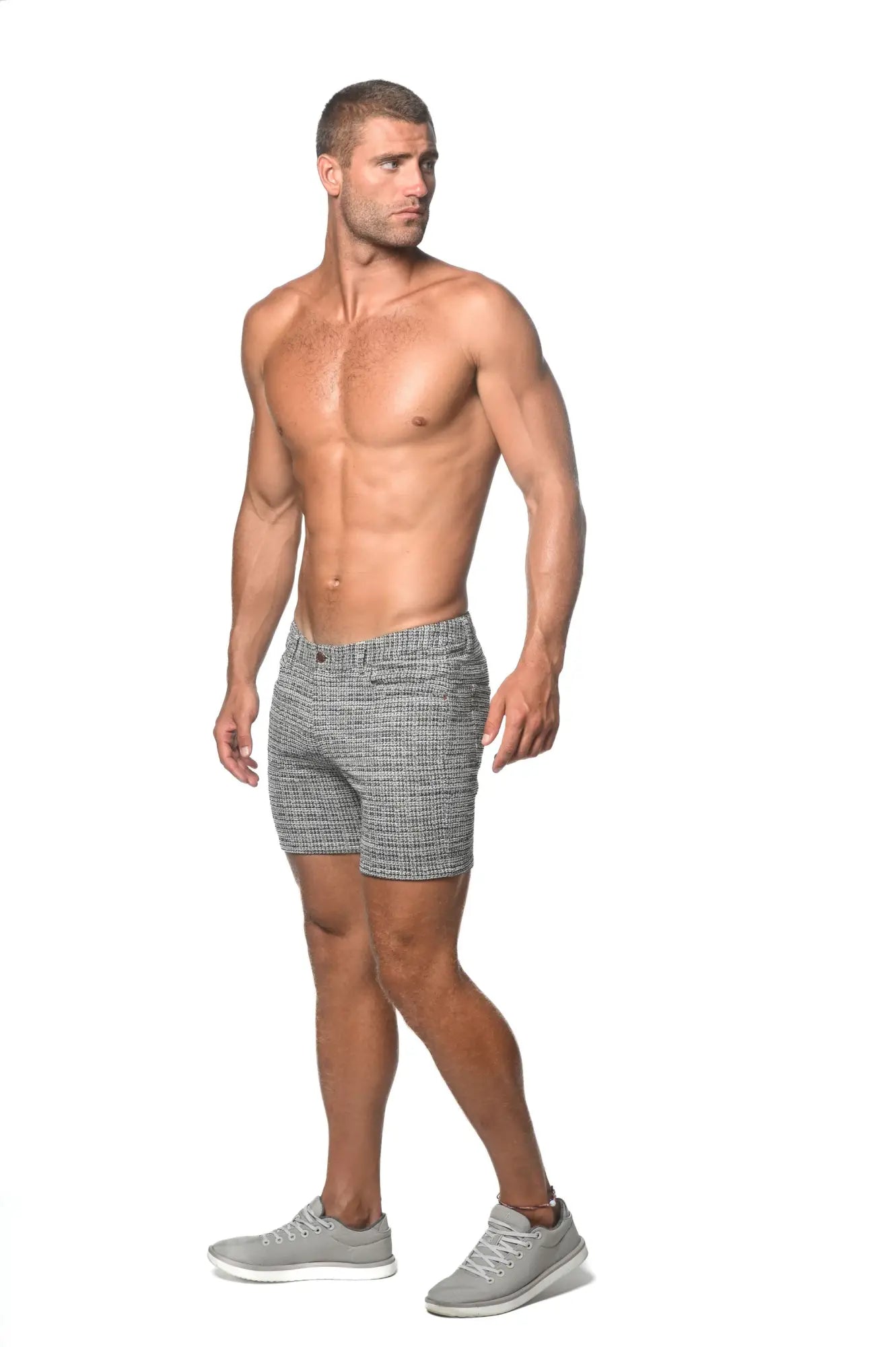 Gray textured tweed-look jacquard stretch knit jeans shorts with subtle herringbone pattern front view