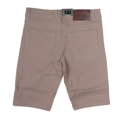 Beige twill stretch skinny shorts with subtle texture and two back pockets featuring branded waistband labels