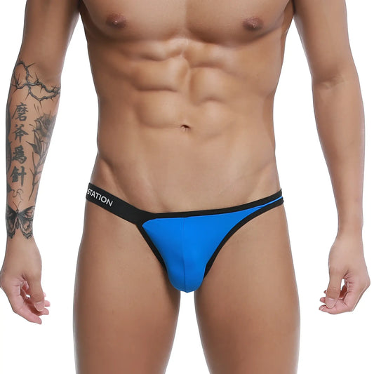 Bright blue calypso bikini thong with black trim and station logo on waistband by u-station royal u0012-432