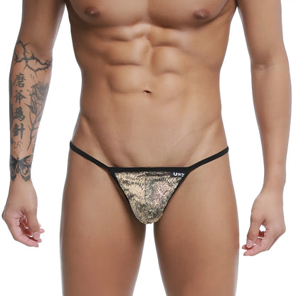Black and gold patterned u-station string thong with sleek modern design and peacock motif in front view