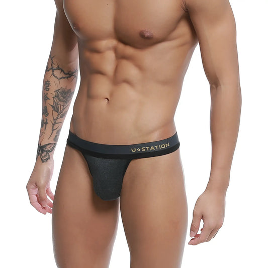 Black u station brand talent thong with subtle heathered texture and gold lettering on waistband gray u0104-013