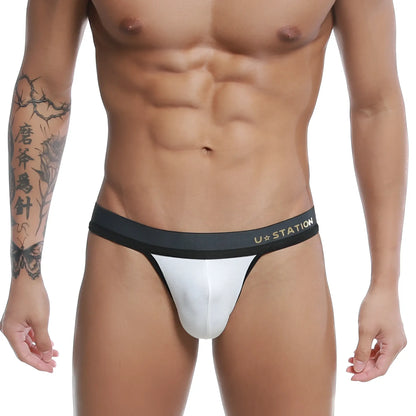 White u station talent thong with black waistband showing front design in soft fabric for comfortable wear