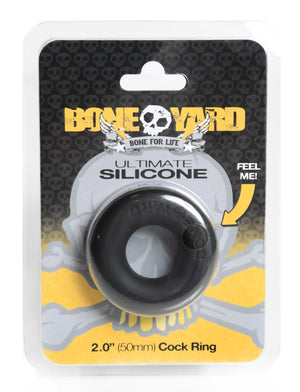 Black silicone cock ring from Bone Yard with smooth circular design and embossed skull logo, ultimate silicone ring black
