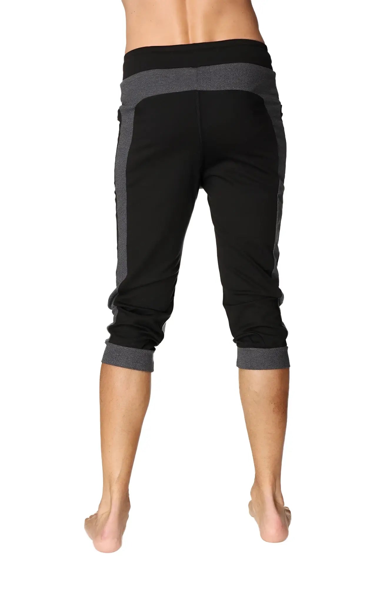 Black and gray ultra-flex tri-color cuffed yoga pants with ribbed waistband side heathered gray panels and rolled cuffs