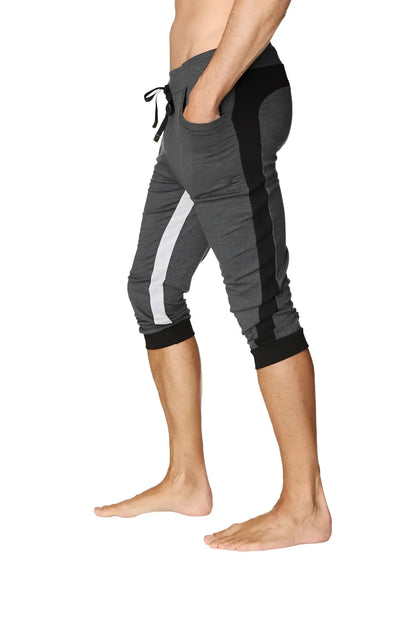 Ultra-flex tri-color cuffed yoga pant in charcoal with black and grey featuring white side stripe and athletic capri fit