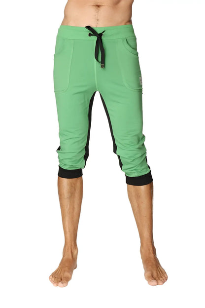 Green ultra-flex tri-color cuffed yoga pant with black side panels and elastic cuffs in capri length