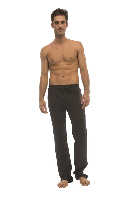 Black cotton ultra flex yoga track joggers with drawstring waist and elastic cuffs for comfortable movement