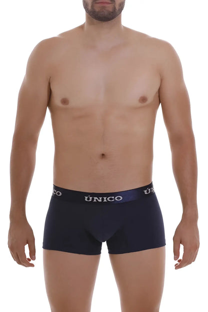 Navy blue unico 22120100102 profundo a22 trunks with white and dark purple waistband featuring único branding