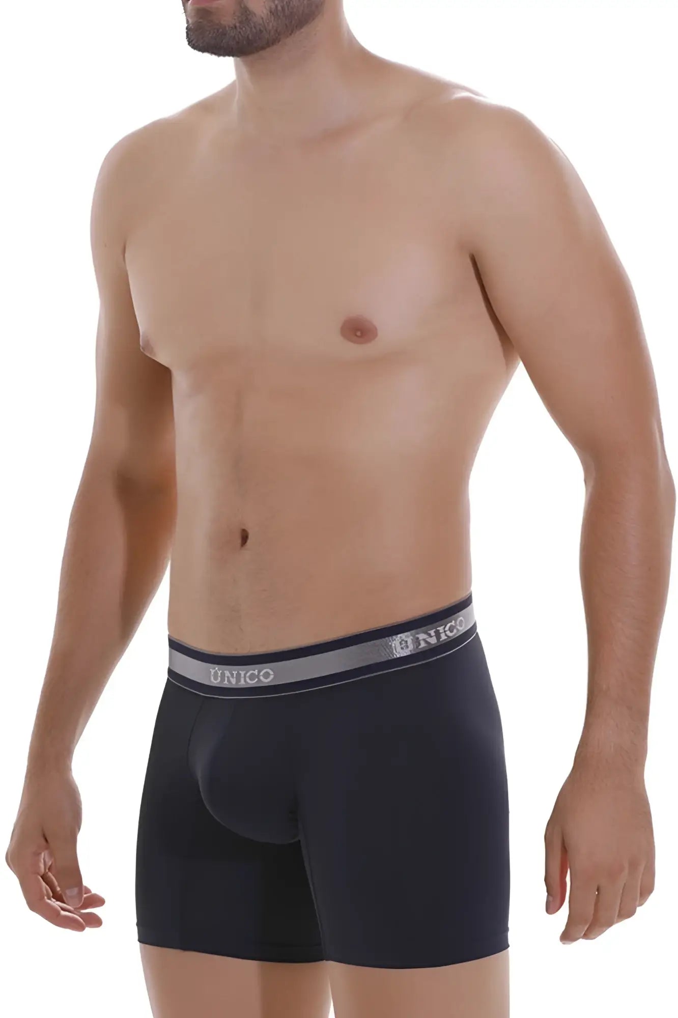 Black unico boxer briefs with a gray waistband featuring unico branding in white lettering, style cardenal m22 color dark blue