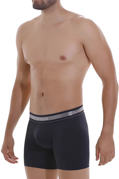 Black unico boxer briefs with a gray waistband featuring unico branding in white lettering, style cardenal m22 color dark blue