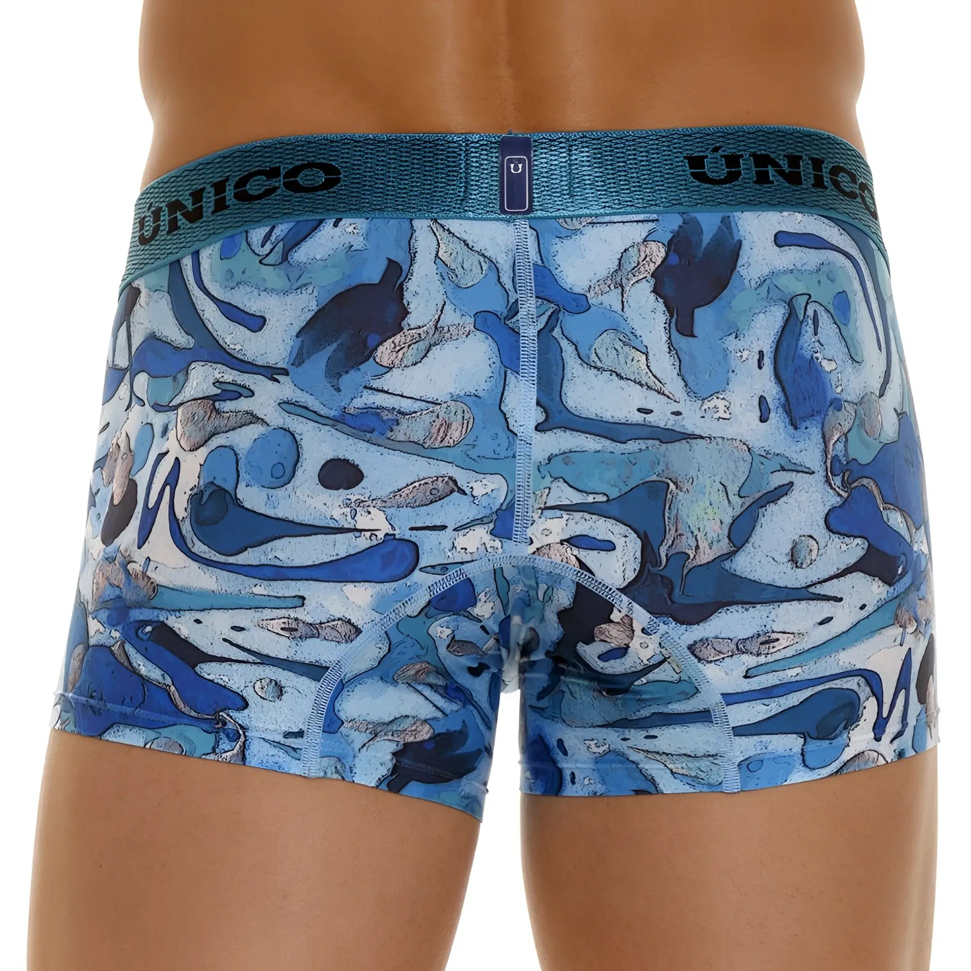 Blue and white abstract patterned unico men’s boxer briefs with textured elastic waistband in color 46-blue