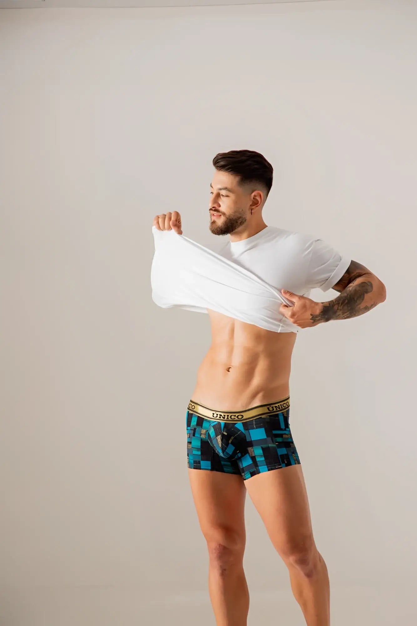 Unico 24010100104 Esquema trunks in blue with black geometric pattern and gold waistband boxer briefs
