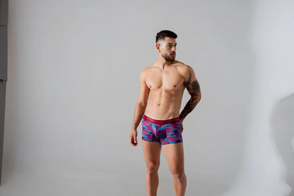 Men’s boxer briefs unico 24020100112 yute trunks color 89-red with vibrant pink blue purple geometric pattern and red waistband