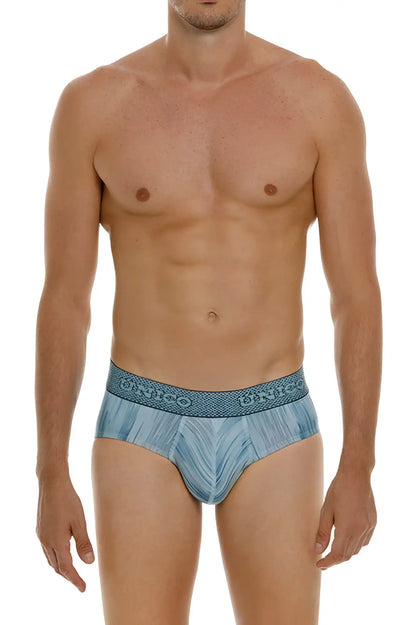 Blue patterned unico 24080101112 hilada briefs with textured waistband featuring dinco brand name color 43-blue