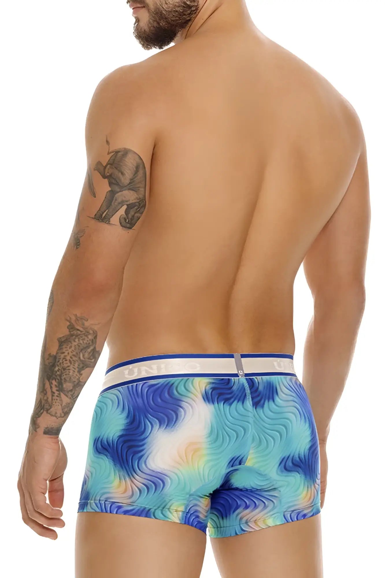 Blue and white tie-dye men’s briefs with a contrasting blue waistband and unidos branding unico 24100100105 moscatel trunks