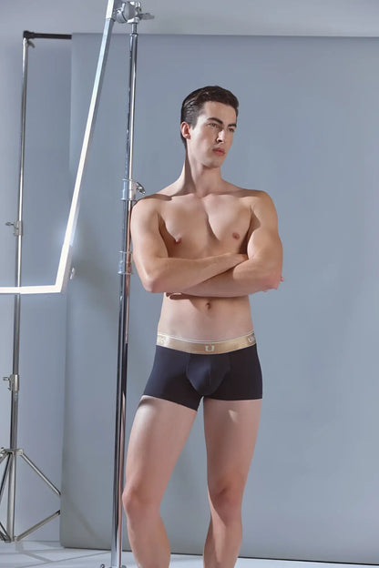 Black unico 24110100110 lingote trunks with gold waistband and brand logo in black color for comfortable wear