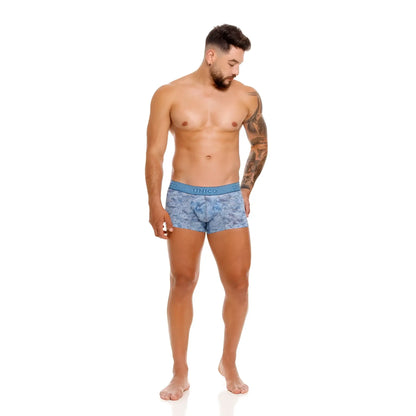 Blue patterned men’s boxer briefs with solid blue waistband and unico brand name ostion trunks color 46-blue