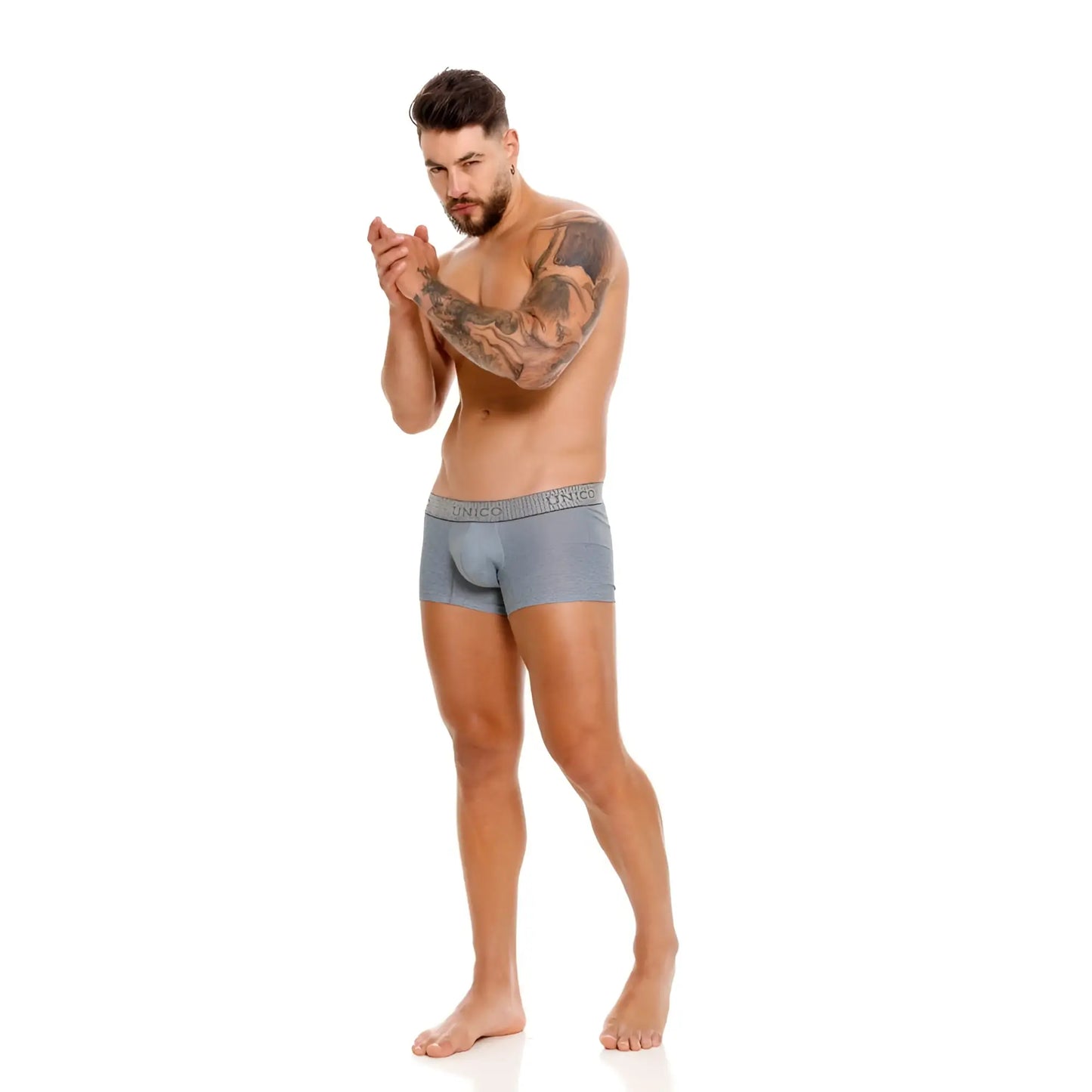 Gray men’s briefs with a subtle textured waistband featuring the unico brand name and comfortable baldio trunks design
