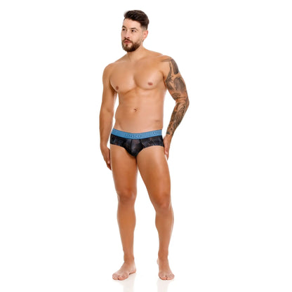 Black patterned Unico briefs with blue elastic waistband featuring Unico brand name in color 99 black