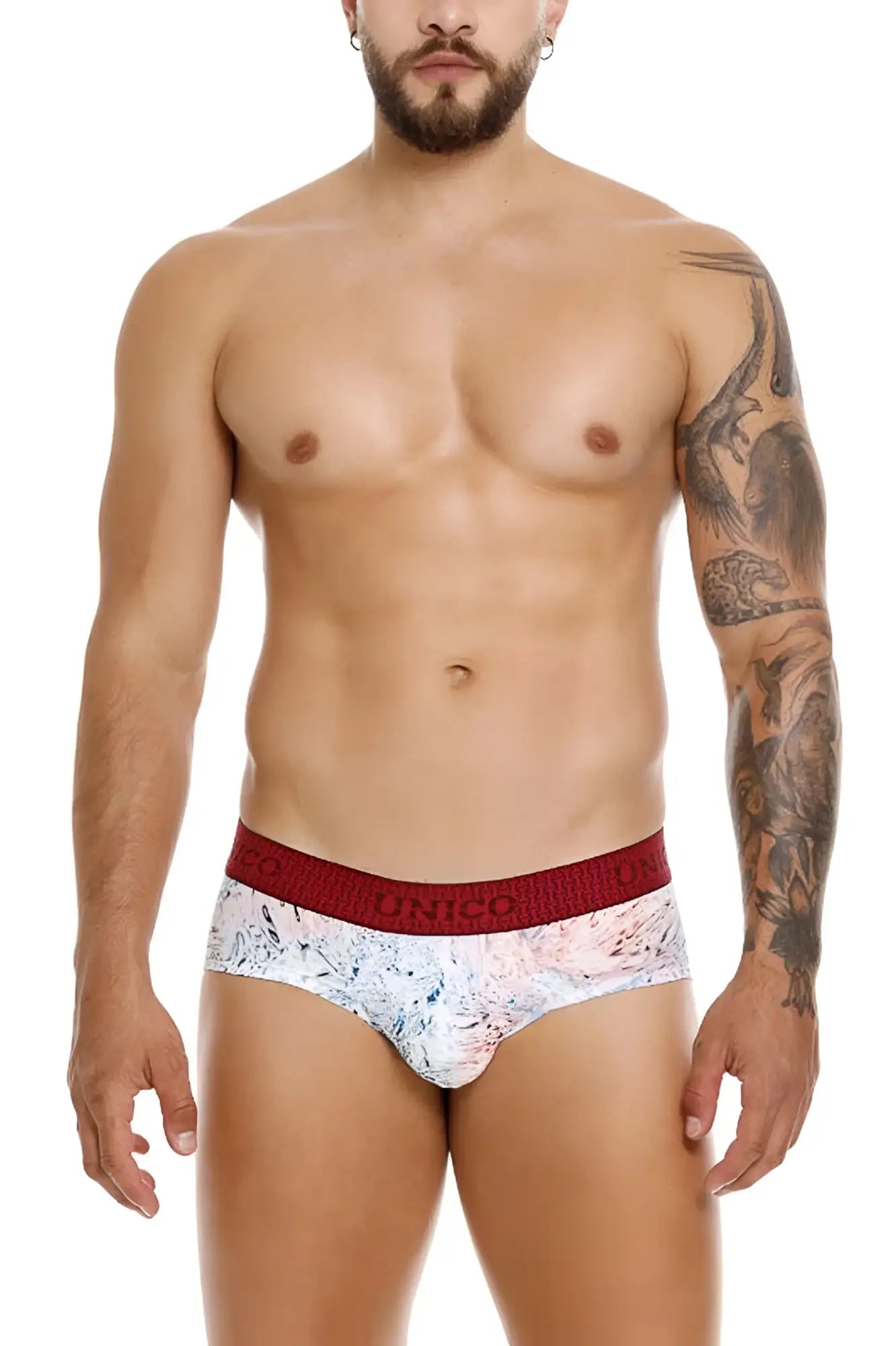 White and red patterned unico 25020101103 rizo briefs with bold red elastic waistband featured brand name