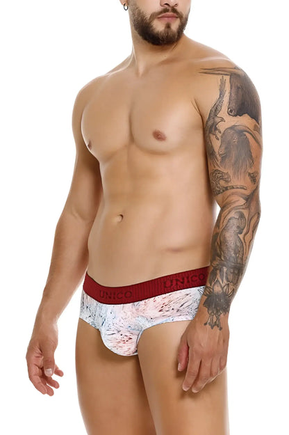 White and red patterned Unico 25020101103 Rizo briefs with bold red waistband featuring Unico brand name