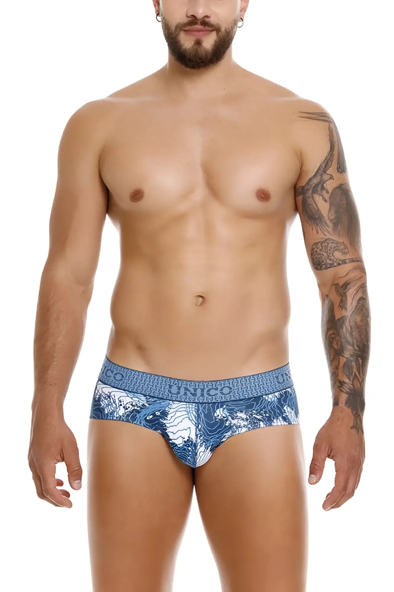 Blue and white patterned men’s briefs with repeating unico logo on waistband unico 25020101117 barniz briefs color 46-blue
