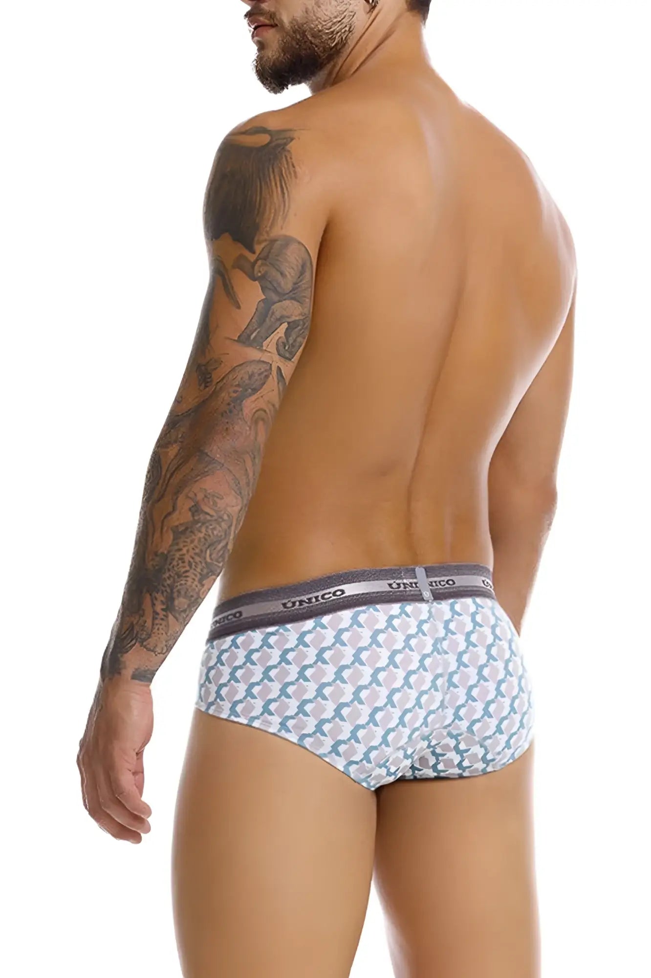 Men’s unico caterva briefs in white and teal pattern with gray elastic waistband shown from the back side