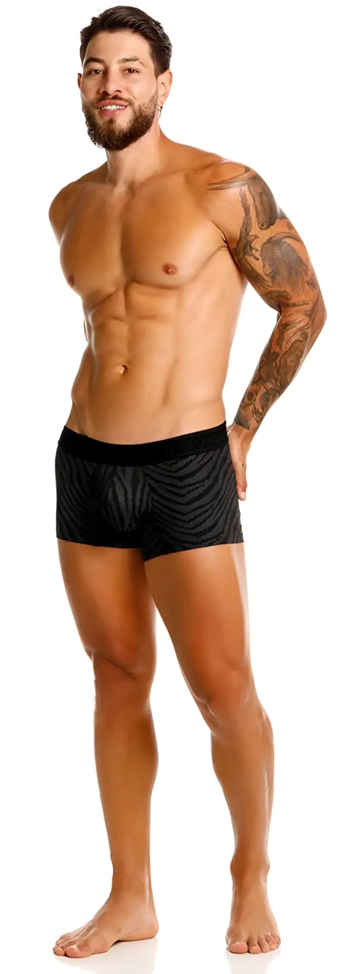 Black Unico 25050100104 Zelmur trunks featuring a textured wavy pattern on soft breathable fabric
