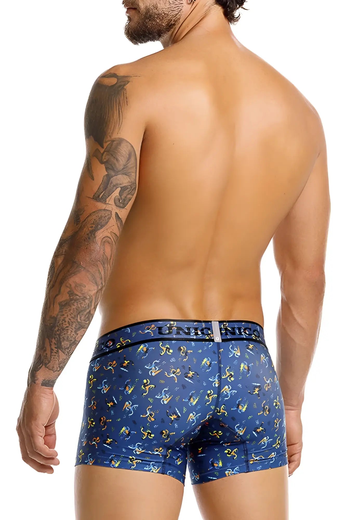 Blue boxer briefs with yellow and white cartoon figures and unico nics waistband in pacer trunks color 46-blue