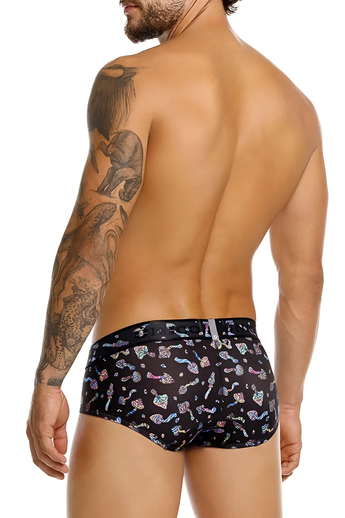Black unico 25060101103 hongos briefs featuring a vibrant iridescent pattern of colorful mushrooms and abstract shapes