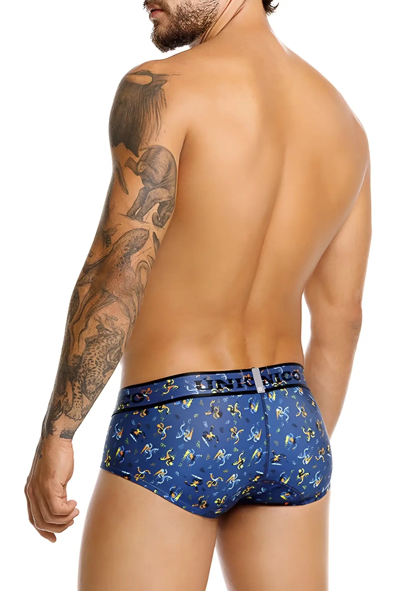 Blue patterned men’s briefs with yellow and white abstract shapes featuring linth nico logo on waistband
