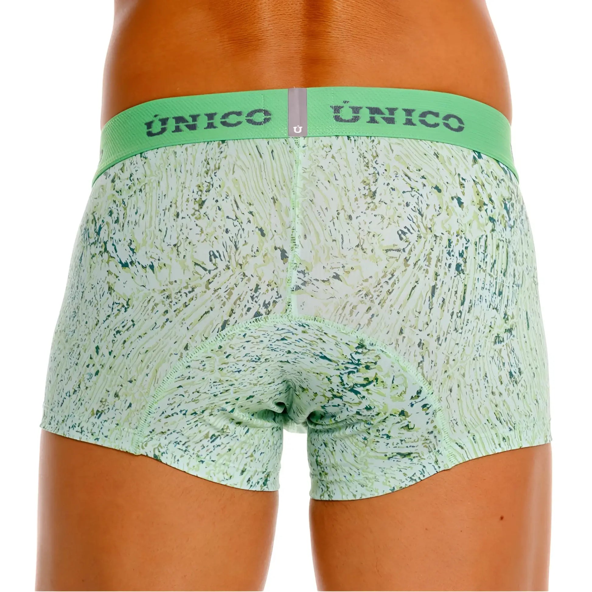 Light green patterned Unico 26020100115 Hunos trunks with matching elastic waistband featuring Unico brand name